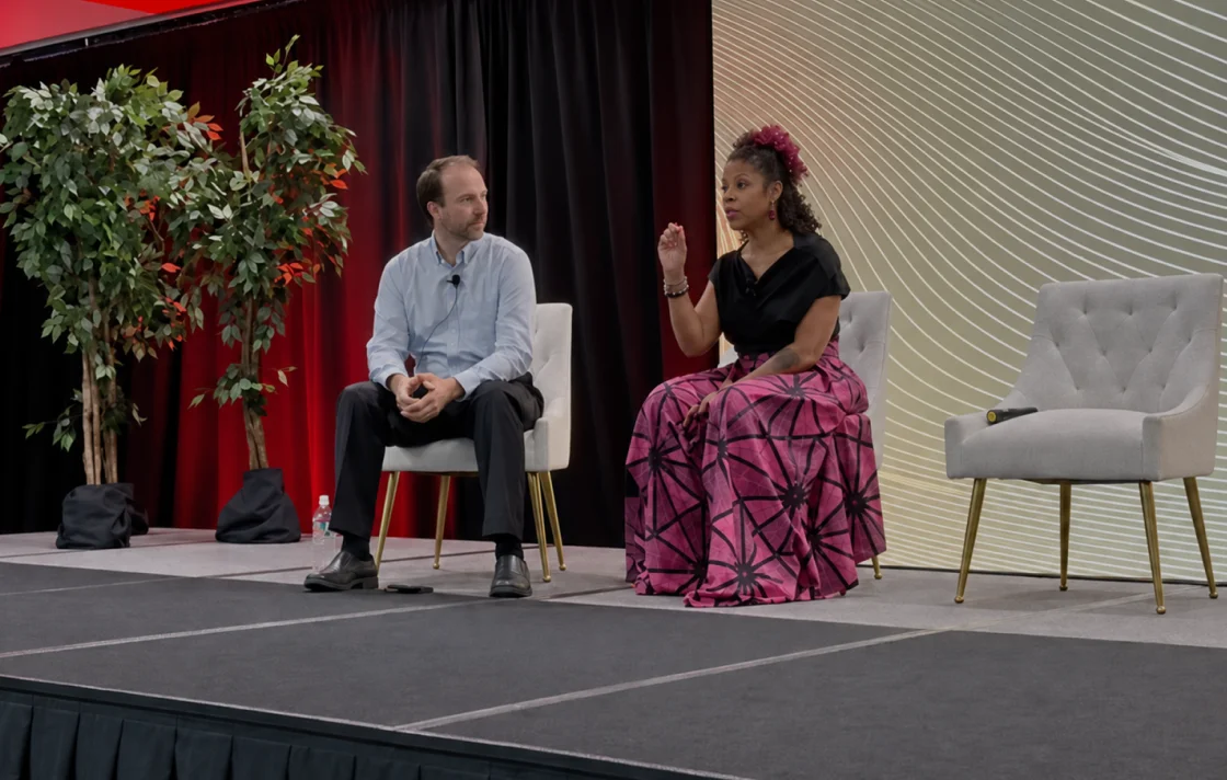 Maestra co-founder with the PuffCuff founder on stage at a Miami e-commerce conference